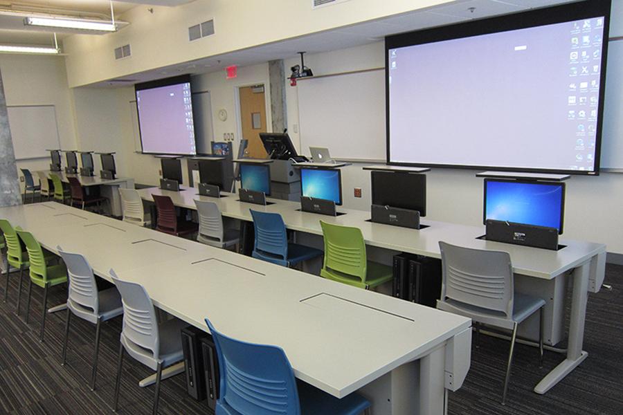 View of Campbell G15 showing desks with computers and projection screen